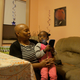 Rhonda Anderson holds her granddaughter, Zala.